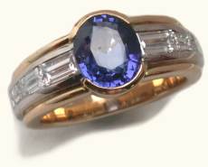 Ring 750/ooo Gold, ein Saphir 2,15 ct, Diamantbaquettes vvsi/topwesselton 1,19 ct